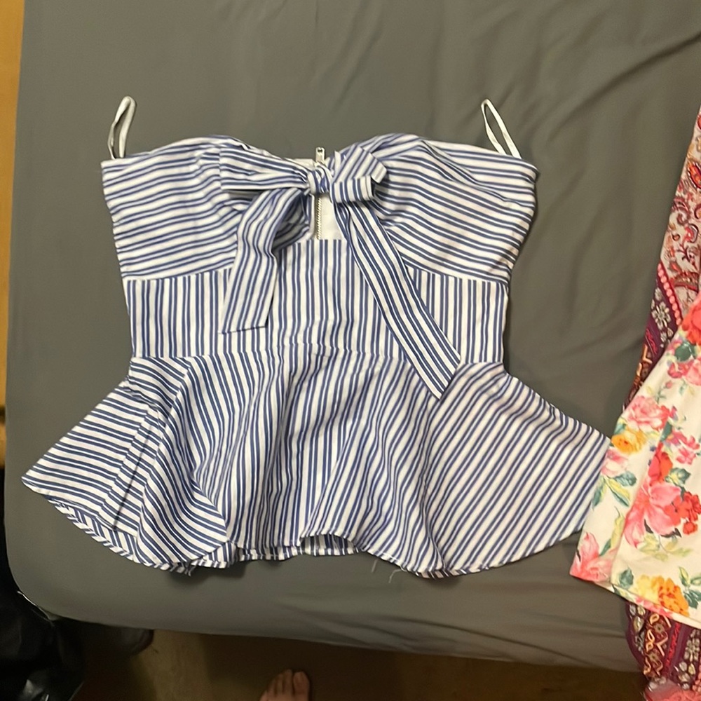 Bebe peplum sleeveless top sz small